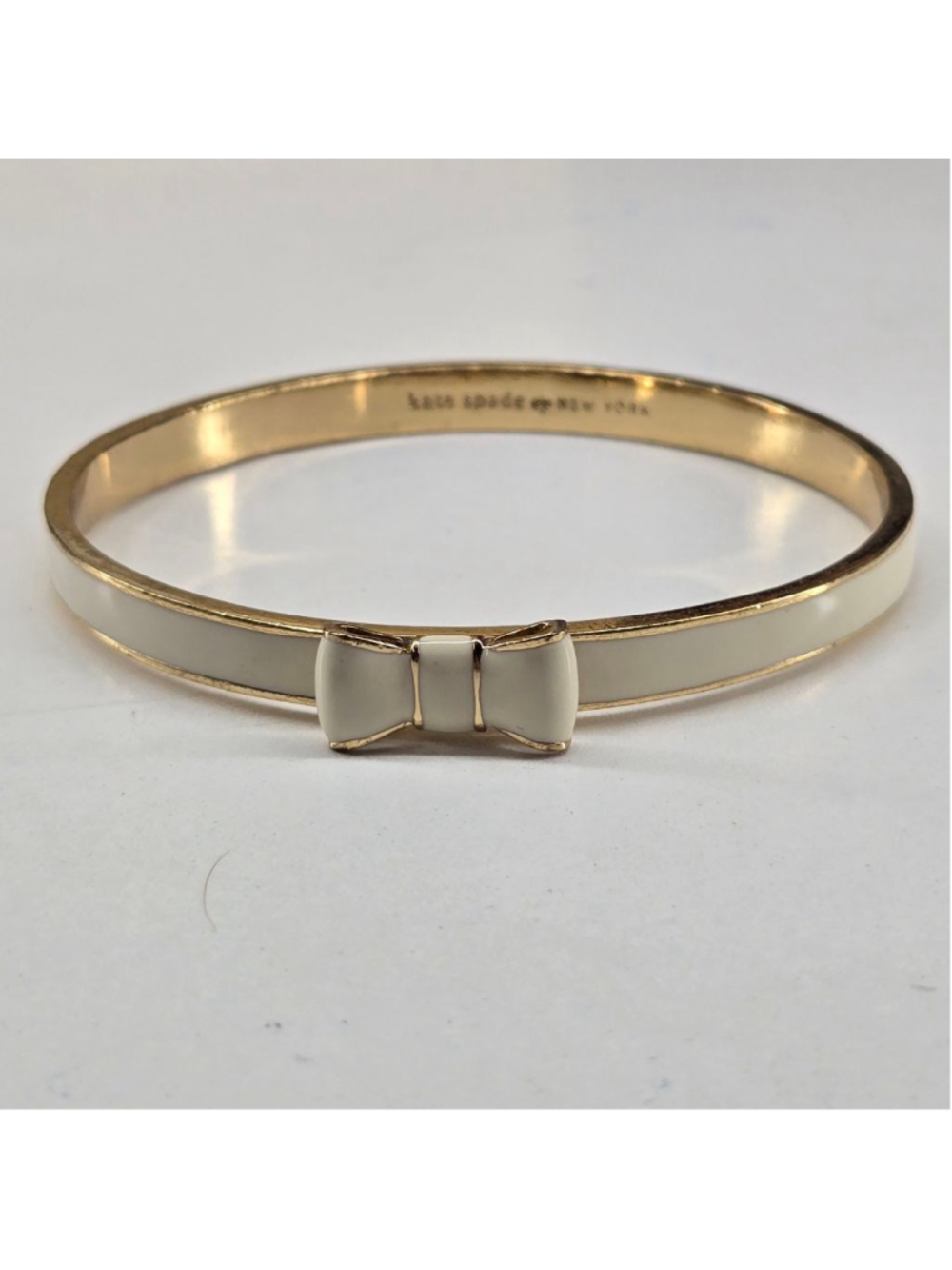 Kate Spade Take a Bow Bangle Bracelet Women's Gold Ivory Cream Classic Ribbon